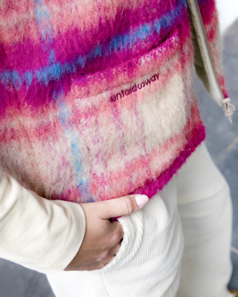 Reversible sleeveless jacket